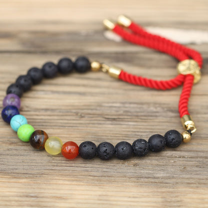 Le Bracelet Éveil Énergétique 7 Chakras & Pierres Volcaniques sur Fil Rouge