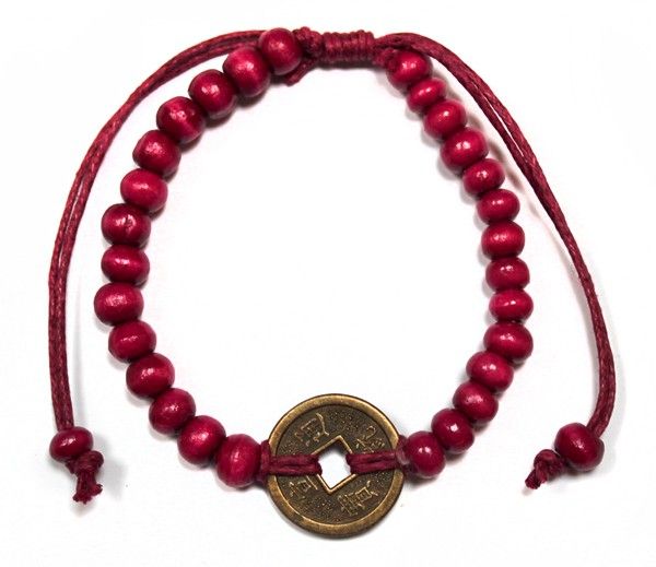 Le Bracelet Feu de l'Annapurna - Bois Rouge & Symbole de Chance