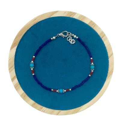 Le Bracelet Bleu de l'Himalaya Onyx Bleu & Perles de Corail